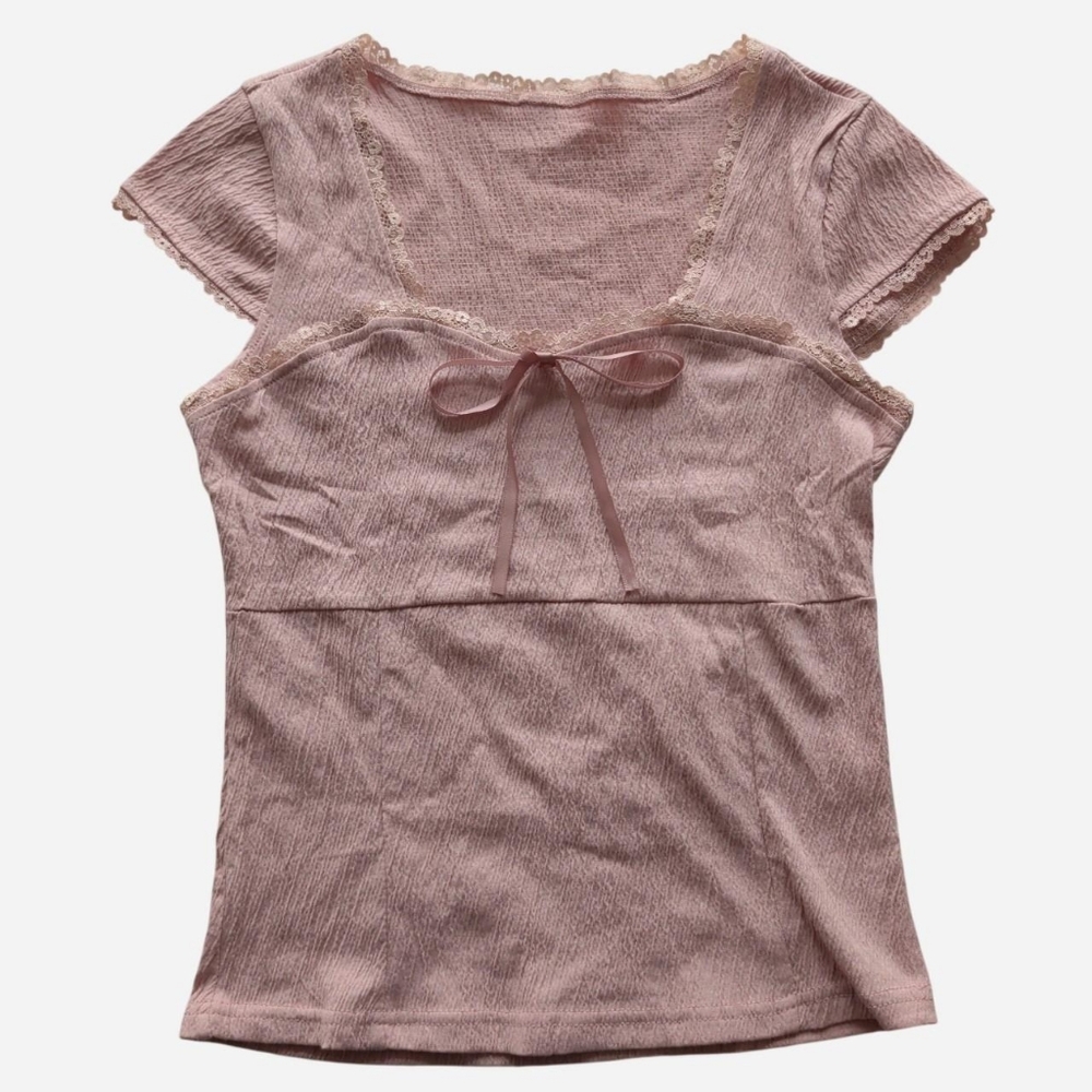 Dusty muted pink crinkle texture top with a lace trim and bow accent